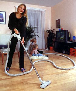 hoovering at house
